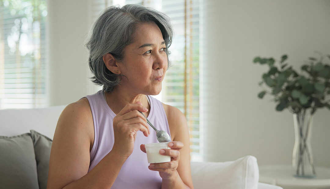 [Image] older adult sampling pudding